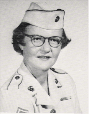 black and white photo of marine wearing glasses